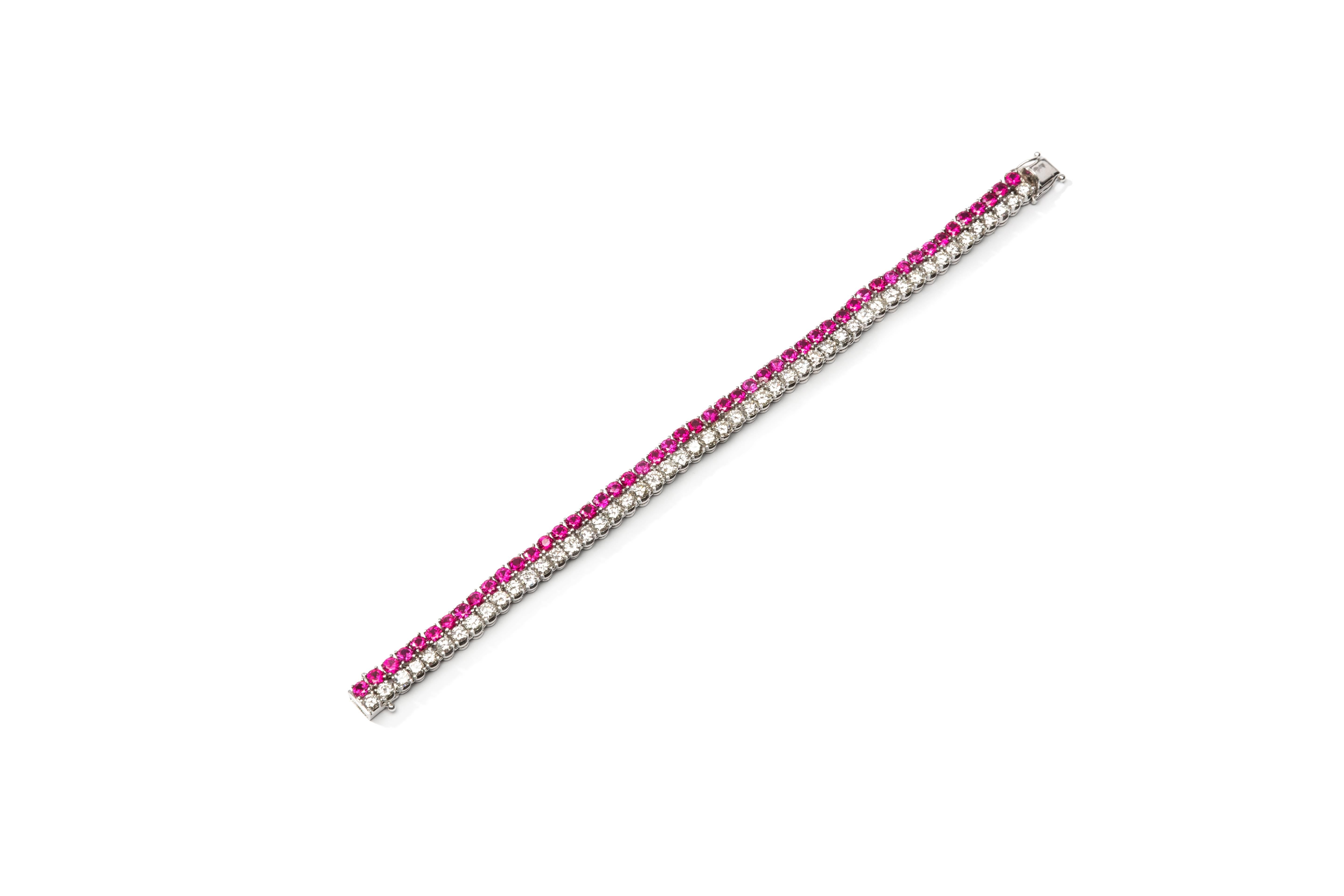 Tennis bracelet, Germany 1960's. Two row bracelet consisting of 1 row 50 Burma rubies weighing circa 11,97 ct. and 1 row of 50 brilliant-cut diamonds weighing approximately 9,0 ct., clarity FL-VVS1, color TW. Mounted in 18K white gold. Hallmarked