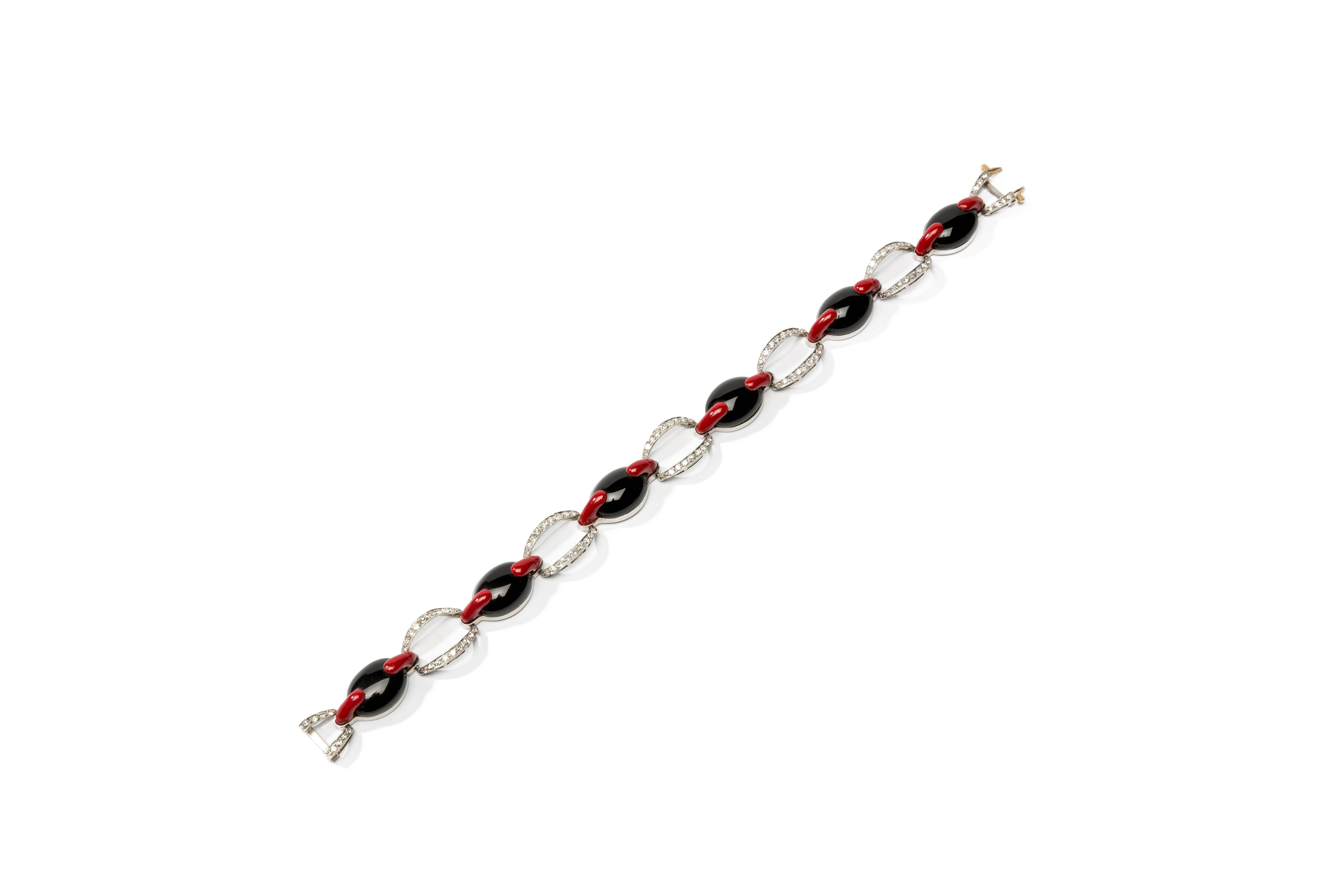 Geometrically designed link bracelet with 106 single-cut diamonds weighing circa 1,59 carat, 6 oval shape onyx and red enamel. Mounted in platinum. Total weight: 27,47 g. Length: 7.87 in ( 20 cm ), Width: 0.51 in ( 1,3 cm )
