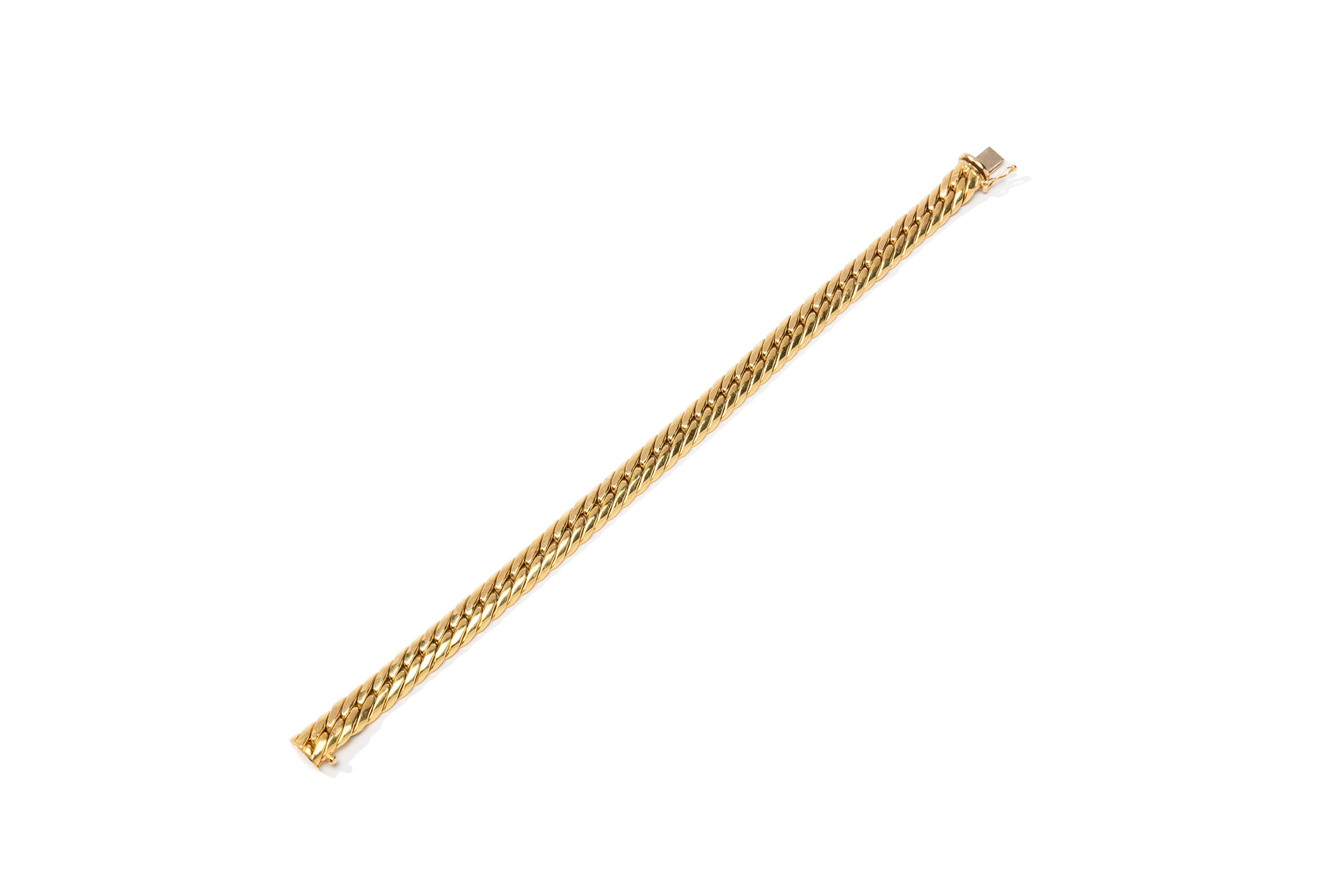 Set in 14 carat yellow gold. Hallmarked on the clasp: 585 GGS. 
Total weight: 13,5 grams. Length: 8.07 in ( 20,5 cm ), Width: 0.35 in ( 0,9 cm )
