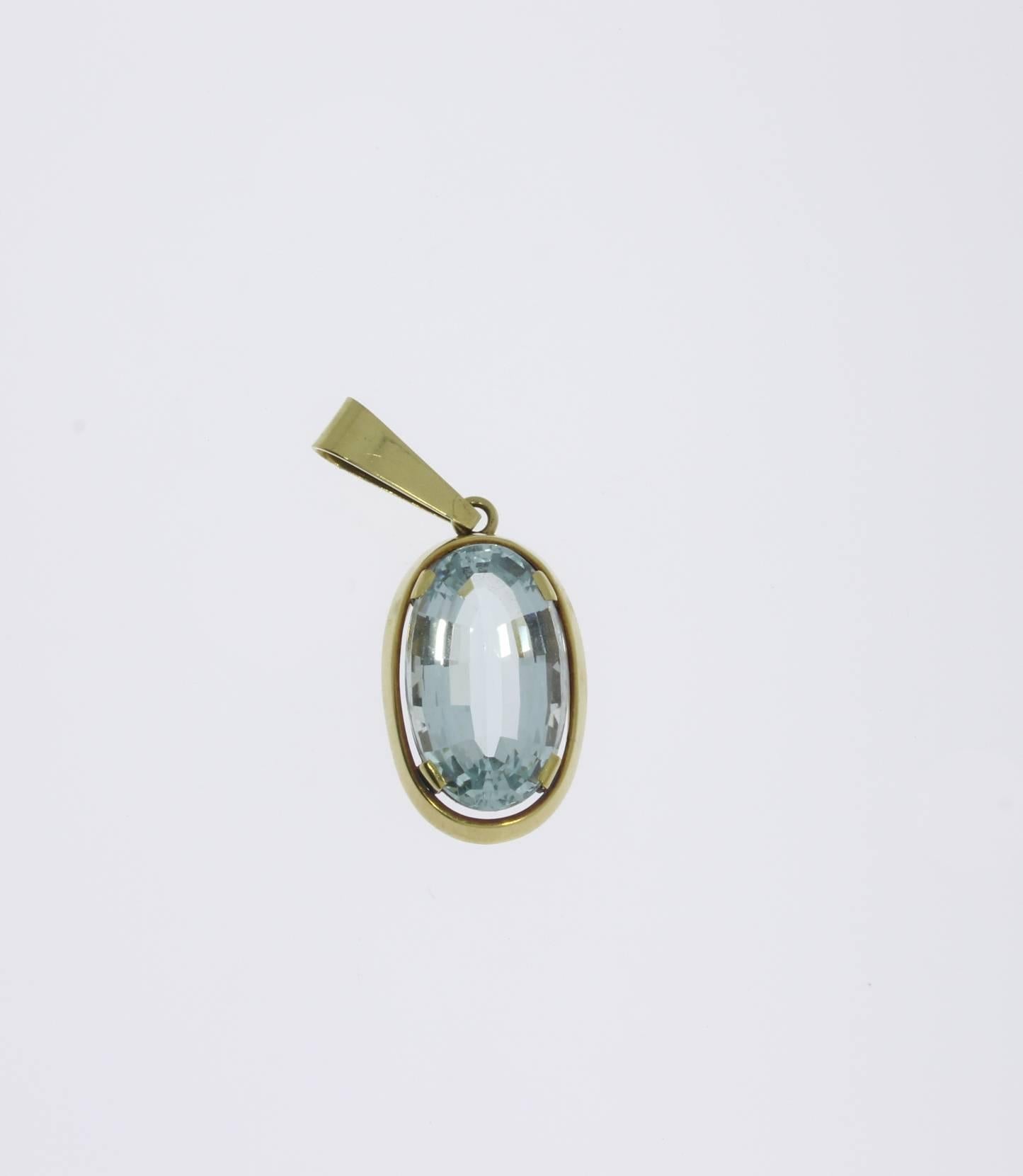 Set with oval shape aquamarine. Mounted in 14 K yellow gold. Marked with the purity 585 on the loop. 
Total weight: 10,61 g. Dimensions: circa 1.85 x 0.71 in ( 4,7 x 1,8 cm ), Height: 0.43 in ( 1,1 cm )