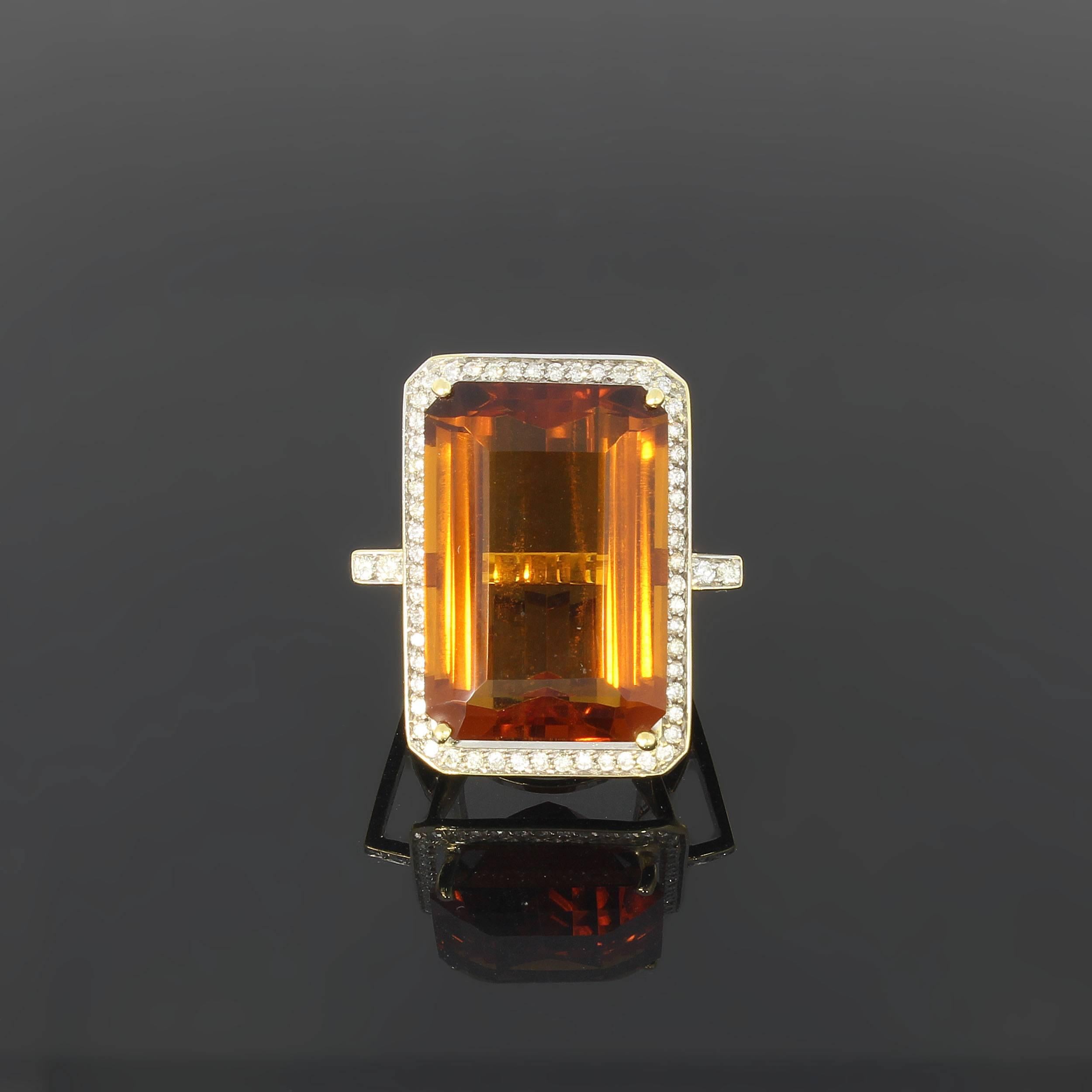 Large citrine weighing 13,4 ct., flanked by 60 brilliant-cut diamonds weighing ca. 1,0 ct. Mounted in 18 K yellow gold.  Hallmarked with 18K and maker mark. Total weight: 13,31 grams. Ring size: 52 ( US 6 ). Resizable.
Measurements: 1.14 x 0.75 in (