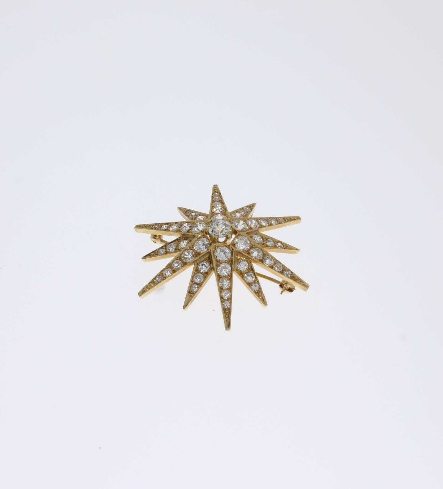 The twelve-rayed star design. 1880's set with 49 old-mine-cut diamonds weighing circa 3,97 ct. 
Mounted in 18 K yellow gold. Total weight: 8,57 grams. Dimensions: 1.38 x 1.69 in ( 3,5 x 4,2 cm )