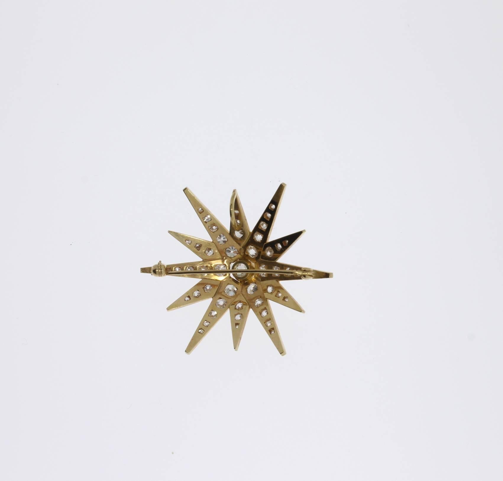 Old Mine Cut Diamond Gold Twelve-Rayed Star Brooch Pendant For Sale