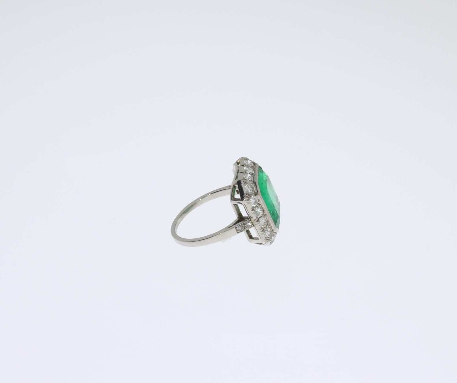 Brilliant Cut Art Deco Central 4.76 Carat Emerald Diamond Platinum Ring For Sale
