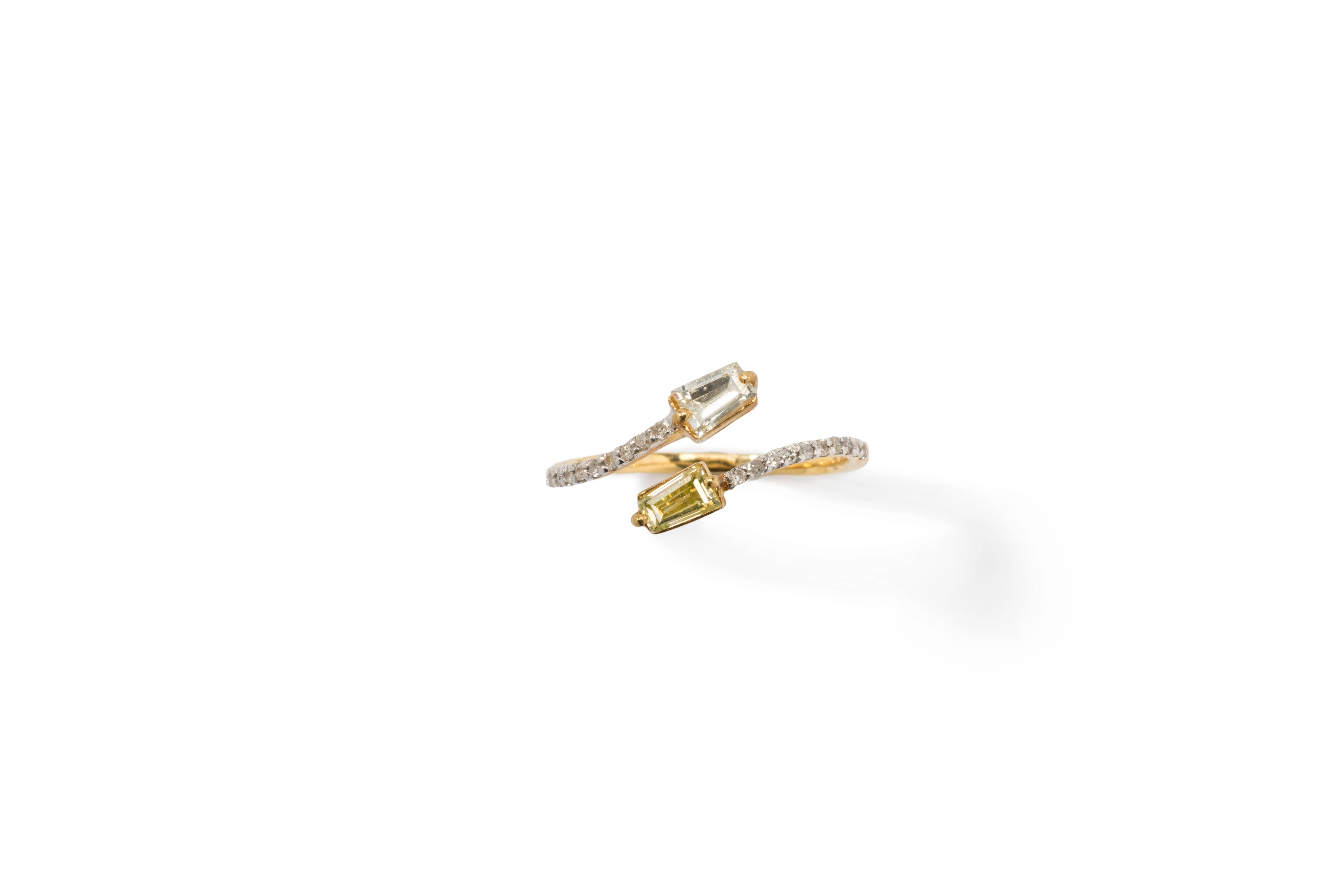 Set with 2 baguette-cut diamonds weighing 0,57 ct. Color: white or natural fancy yellow. 
The ring band accented by 20 brilliant-cut small diamonds with a total of 0,11 ct. Mounted in 18 K gold. 
Hallmarked with purity 750, makers mark D 0.11ct.