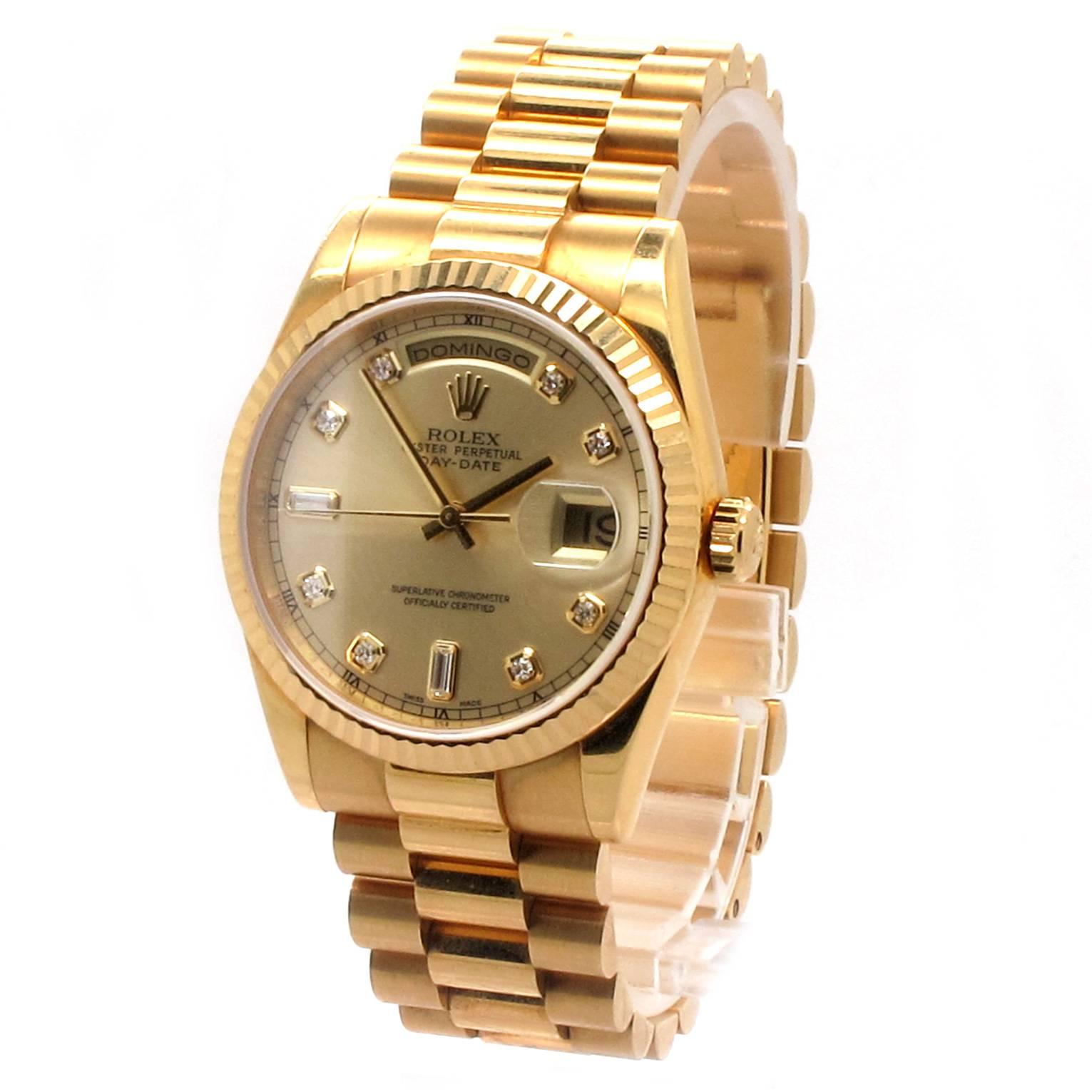 Pre-owned Rolex Day-Date Men's Presidential Watch with a round 36mm 18K Yellow Gold Case. 18K Yellow Gold Fluted Bezel with a Original Champagne Diamond Dial. 18K Yellow Gold President 