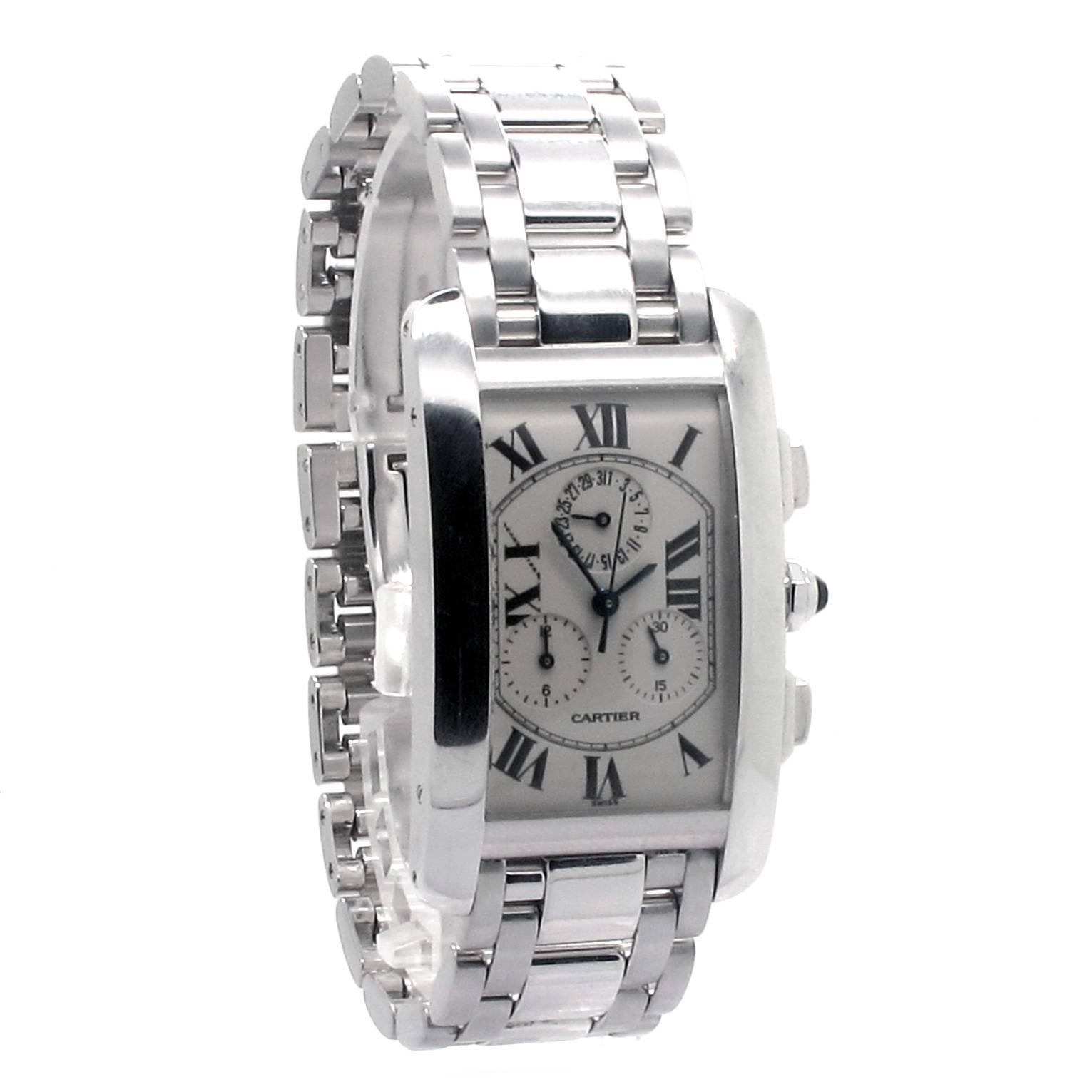 Cartier Tank Americaine W26033L1 Chronoflex Unisex Watch with 28mm x 45mm 18K White Gold Case. Fixed 18 White Gold Bezel. Silvered Dial with Roman Numerals Markers. 18K White Gold Bracelet with Double Folding Clasp. Sapphire crystal Crown topped