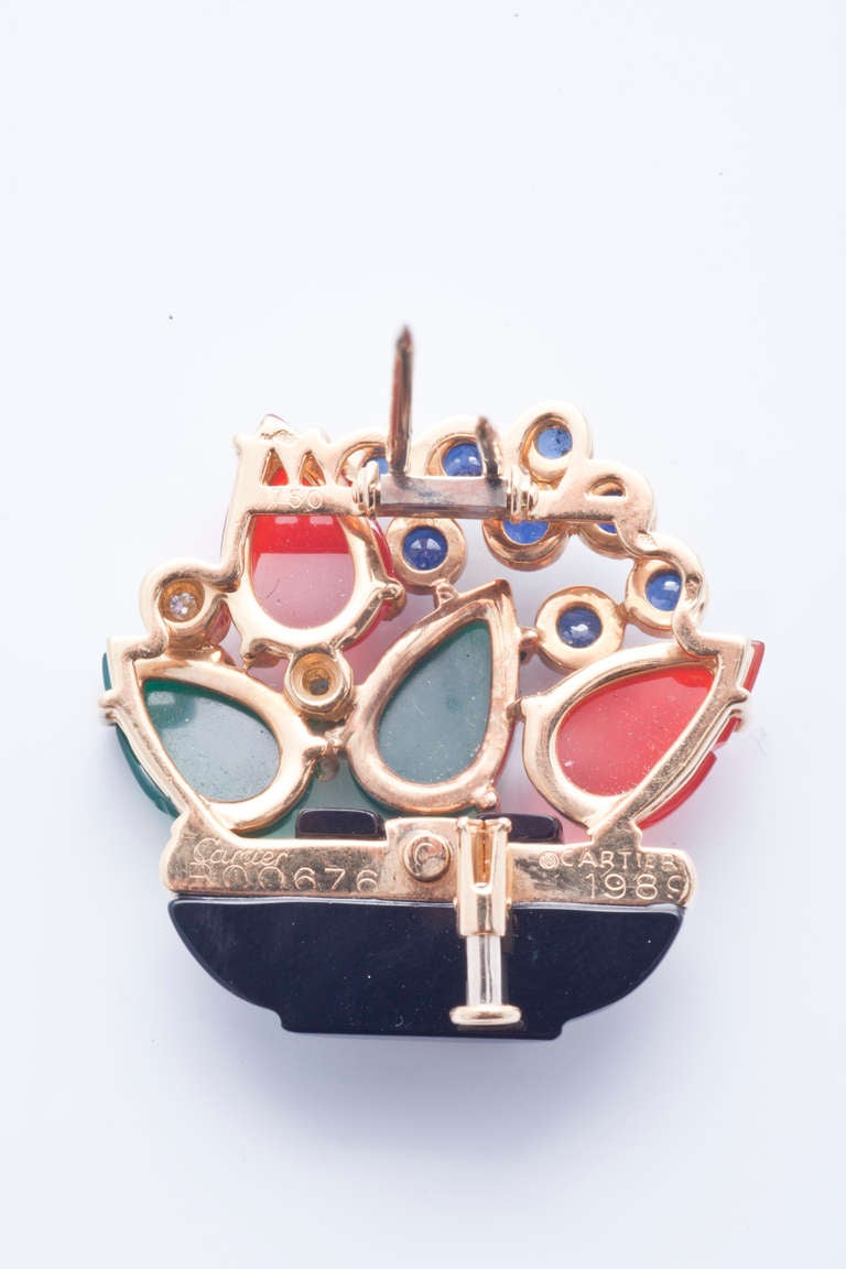 18k yellow gold, diamonds, carnelian, chrysophrases, sapphires and onyx basket brooch by Cartier Paris, 1989