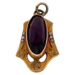 10k Yellow Gold Amethyst Pendant with Floral Detailing