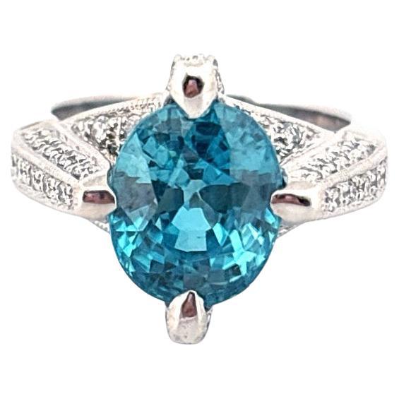 Anillo de oro blanco de 18 quilates con un circón azul de 7,00 quilates y un diamante natural de 1,10 quilates en venta
