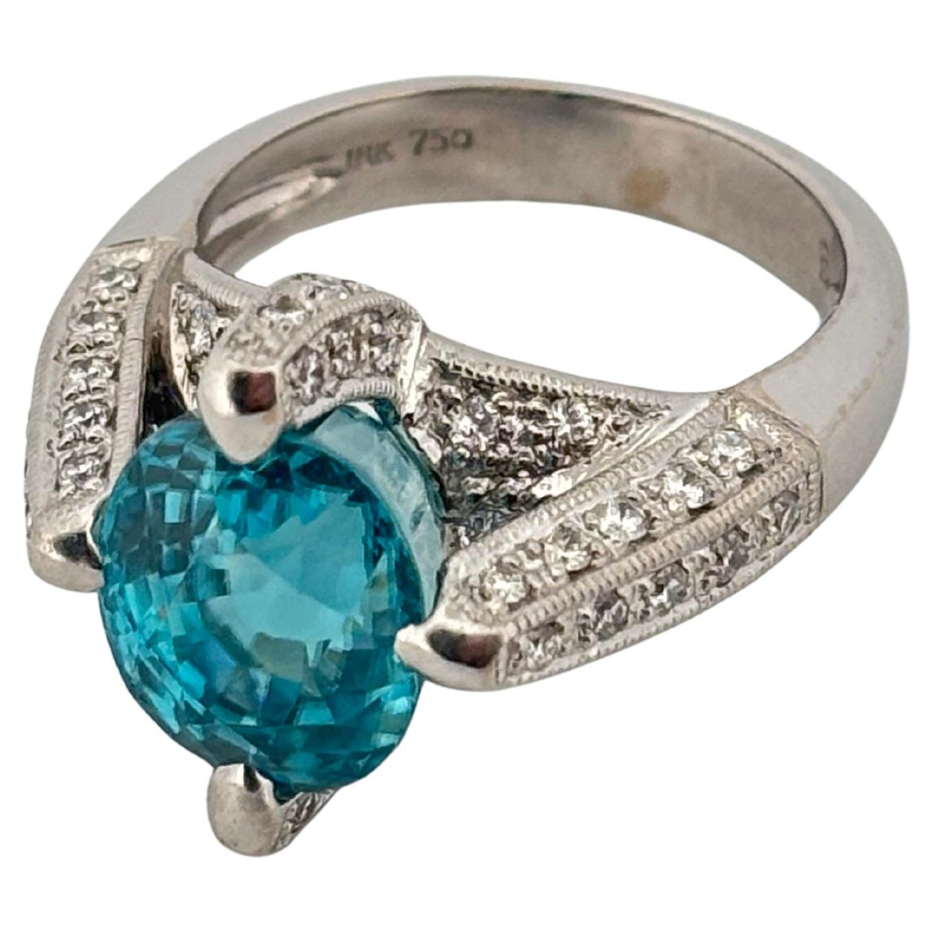 Oval Cut 18K White Gold 7.00 Carat Blue Zircon 1.10ctw H-I SI1 Natural Diamond Ring For Sale
