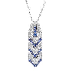 Collana Art Deco con zaffiro blu e diamanti in oro bianco 18 carati