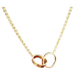 Cartier Interlocking Love Pendant in 18k Yellow Gold B7212400 Box Papers 2021