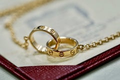 Cartier Interlocking Love Pendant in 18k Yellow Gold B7212400 Box Papers 2021
