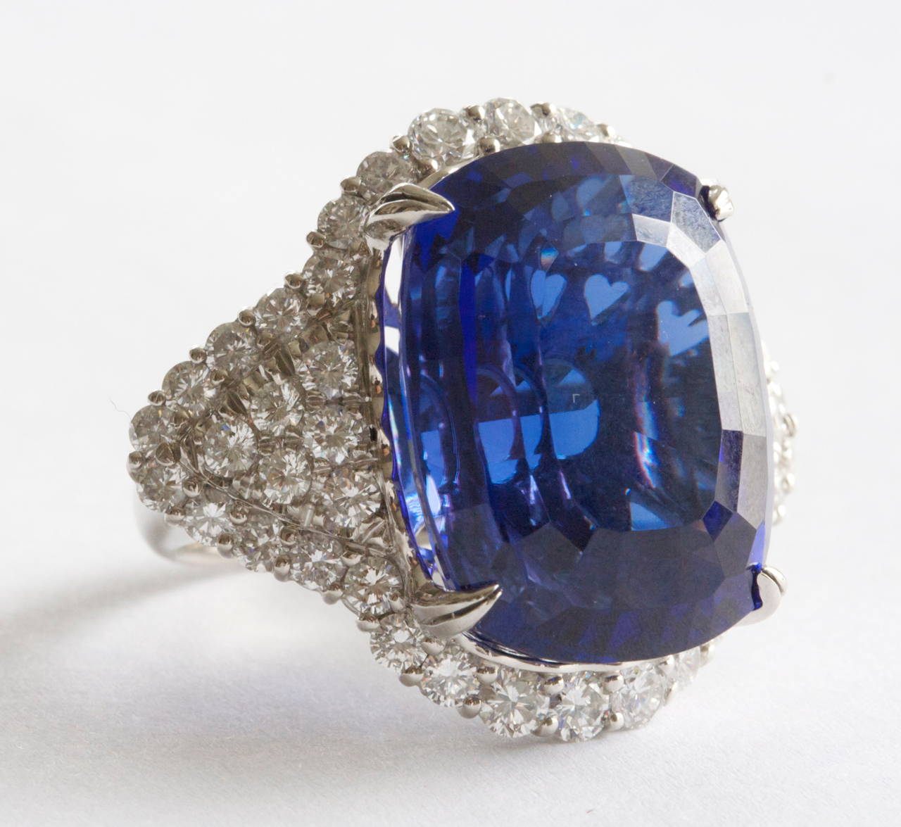 A fabulously designed diamond platinum ring featuring a rare gem quality 41.72  carat natural tanzanite. A tanzanite of this size and quality displaying this dark and vivid blue color is rare. With GIA certificate.

Legend has it, the land was set