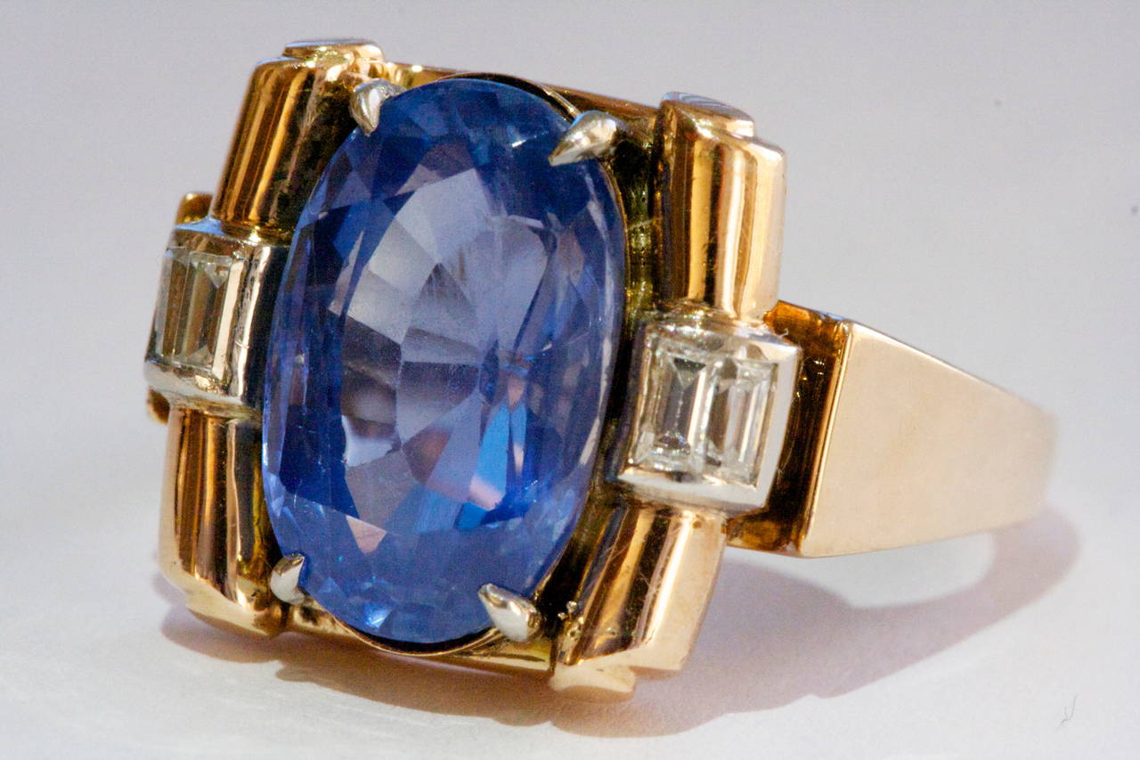 The natural sapphire weighs 7.29 carats and sits comfortably in this well designed retro diamond 18k gold ring. 

Ring size 6 and can be re-sized.