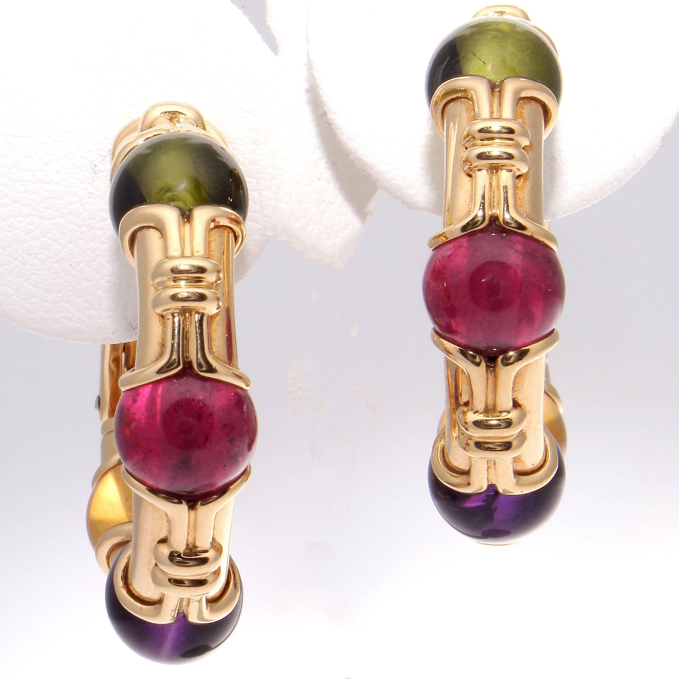 Andy Warhol in an interview said Bulgari jewelry is the 1980's. This is when their distinctive bold colorful designs became their iconic look. 

Featuring cabochon cut lively purple amethyst, golden citrine, reddish-pink tourmaline and green