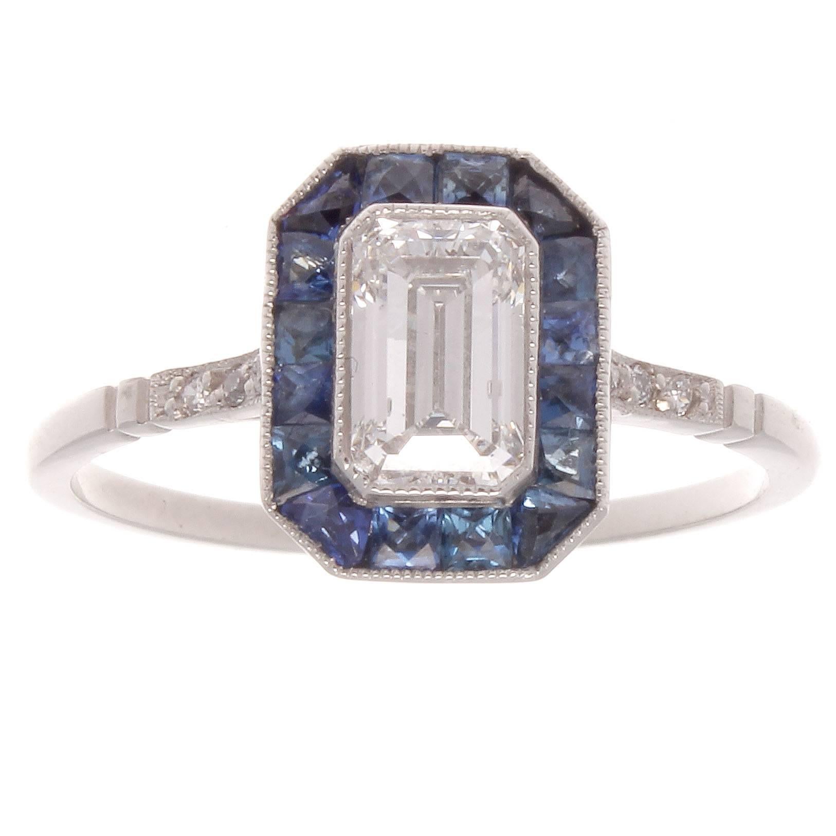 0.68 Carat Emerald Cut Diamond Sapphire Platinum Ring