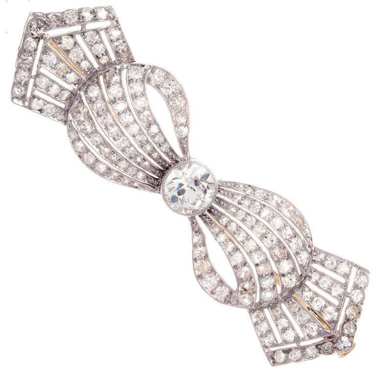 Art Deco Diamond Platinum Bow Brooch For Sale