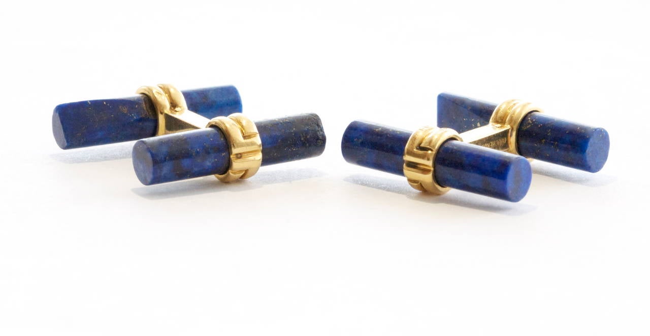 A lovely color display from the Boucheron masonry with these cufflinks. The natural mixture of blue hues from the lapis combined with the 18k yellow gold meld into a pattern of graceful form.

Signed Boucheron