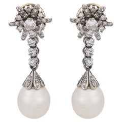 Mid Century 1.75 carat diamond pearl platinum earrings