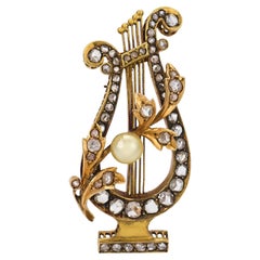 Victorian rose cut diamond pearl 18k yellow gold lyre brooch