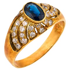 Anello vintage con zaffiro e diamante in oro giallo 18 carati