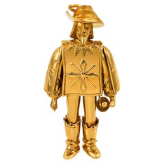 Boucheron 18k yellow gold articulated musketeer pendant