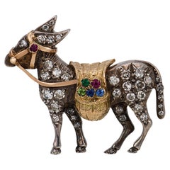 Victorian diamond gemstone 14k yellow gold and silver donkey brooch