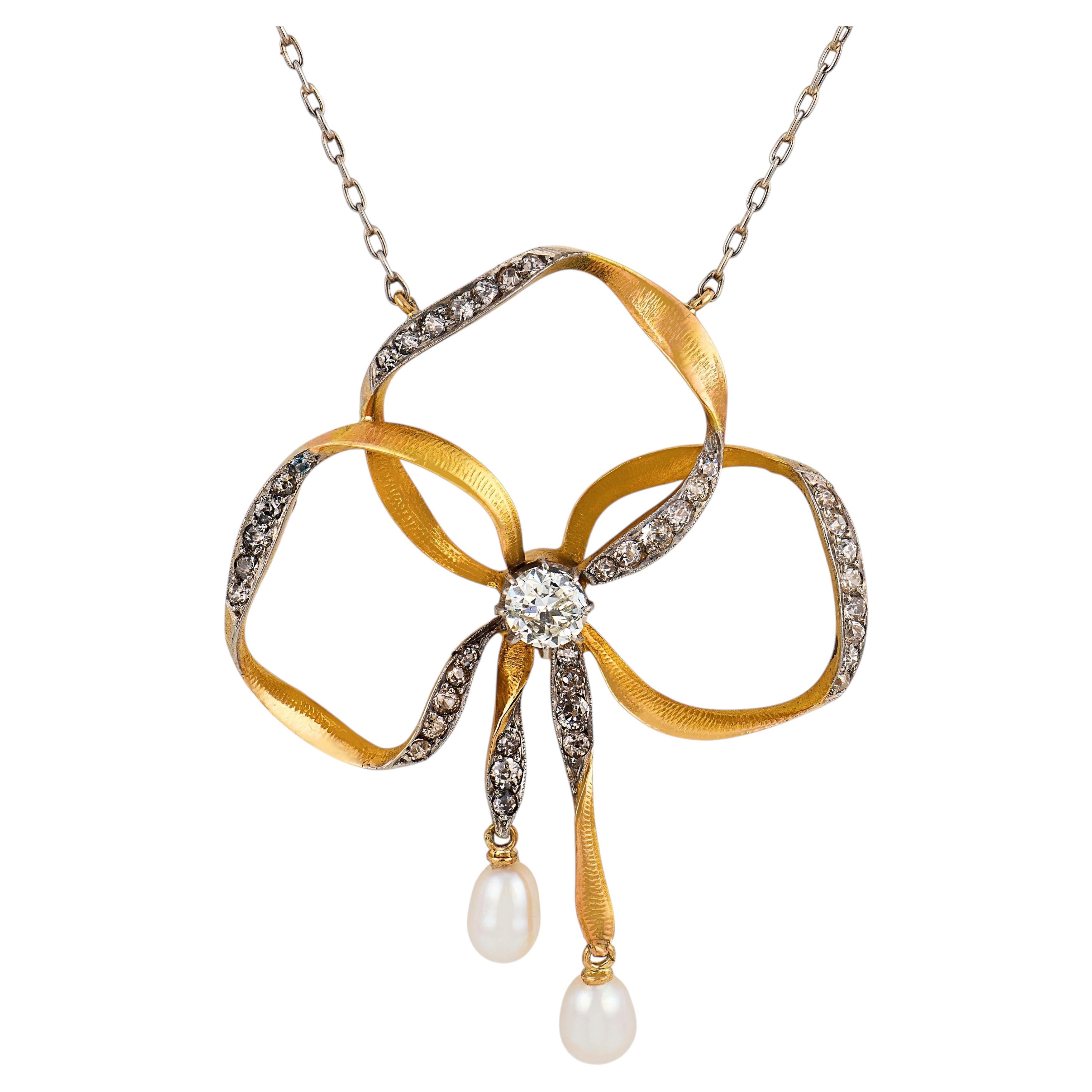 Victorian diamond pearl 18k yellow gold platinum bow necklace For Sale