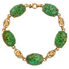 Art Deco Carved Jade Bracelet in 14k Yellow Gold, Circa 1920, 7"