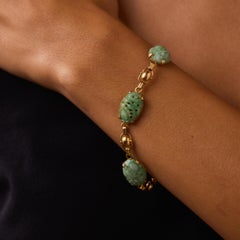 Art Deco Carved Jade Bracelet in 14k Yellow Gold, Circa 1920, 7"