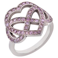 Vintage fancy pink diamond platinum infinity heart ring