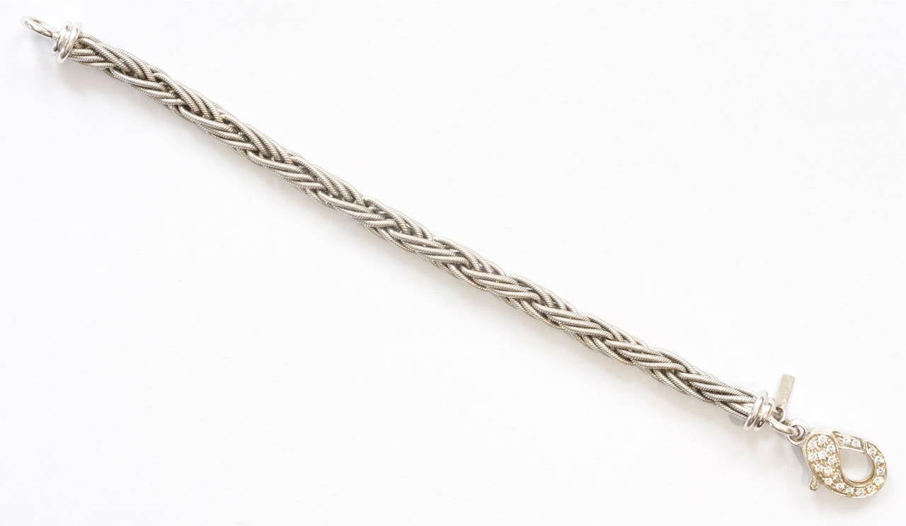 Pepi is a jewelry designer in Beverly Hills and has a store on Robertson Blvd. Here she has intricately weaved the 18k gold to make a rope motif bracelet. With a clasp full of diamonds. Signed Pepi.

Weighs 31.1 grams