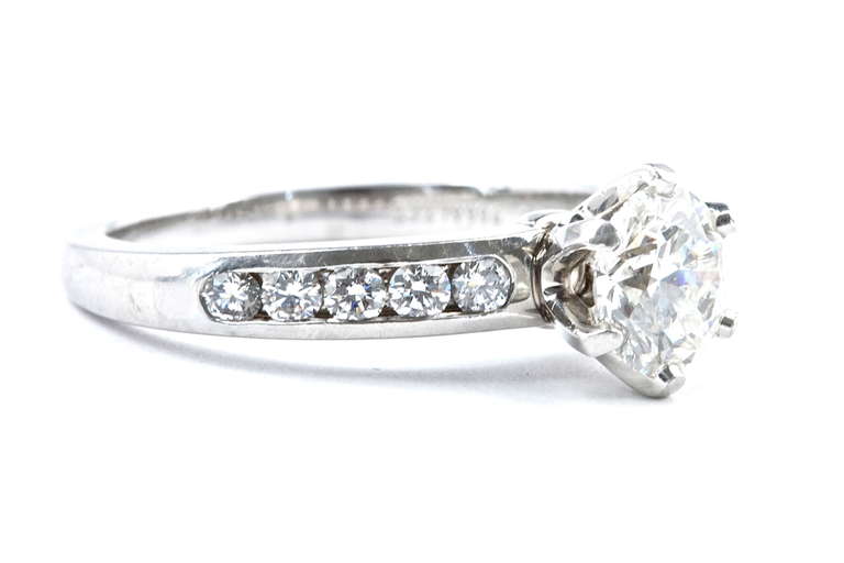 The Tiffany platinum engagement ring features a diamond of 1.07 carats with a Tiffany certificate stating that the diamond is I color and VVS2 clarity. The precision of cut is rated as excellent. Along with the original appraisal.

Ring size 6 1/2