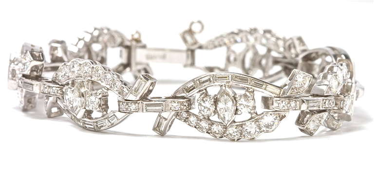 The workmanship of the bracelet is excellent. Each diamond has its own housing only seen  in the best of jewelry. The diamonds have been picked with care and they all match. They are white and clean and the craftsmanship of the settings is