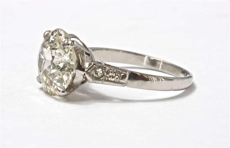 Old European cut 4.16 carat diamond set in a platinum hand made mounting. We grade the diamond as J,K color with clarity characteristics.

Ring size 6 1/2 and can be re-sized.