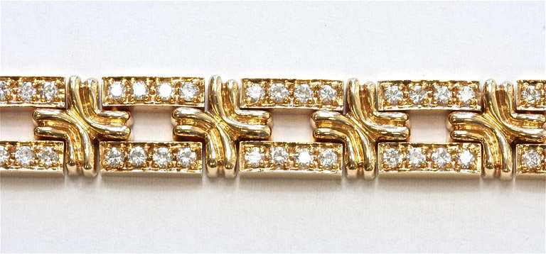 Retro gold bracelet with 96 diamonds weighing approximately 4 carats. 7 inches and 45.7 grams.