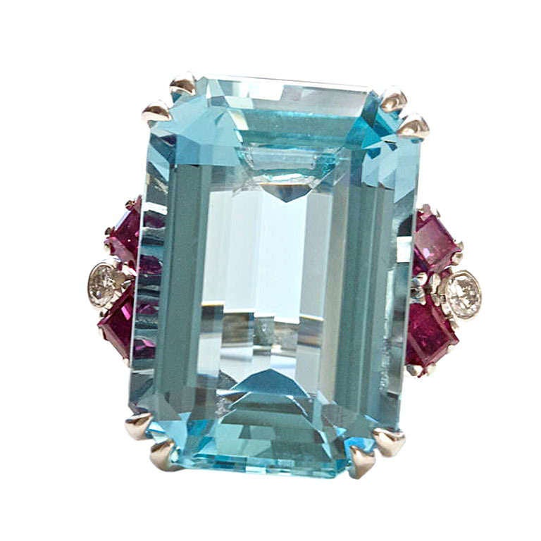 The aquamarine is 21 carats. Lovely clean blue color set in a hand made platinum ring.

Ring size 6 1/2 and can be re-sized.