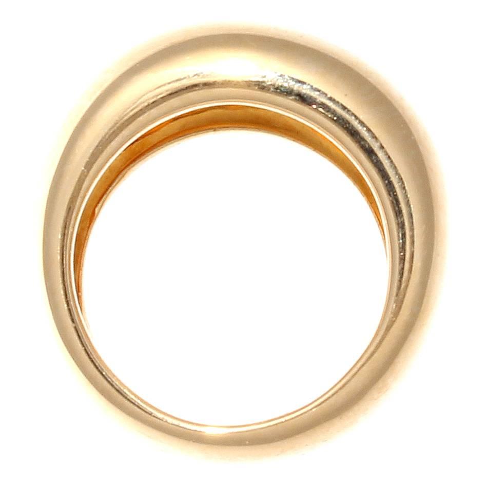 Cartier, elegant and timeless. Smooth gentle lines of 18k yellow gold create this band ring. Signed Cartier, numbered and stamped with French hallmarks.

Ring size 5-3/4