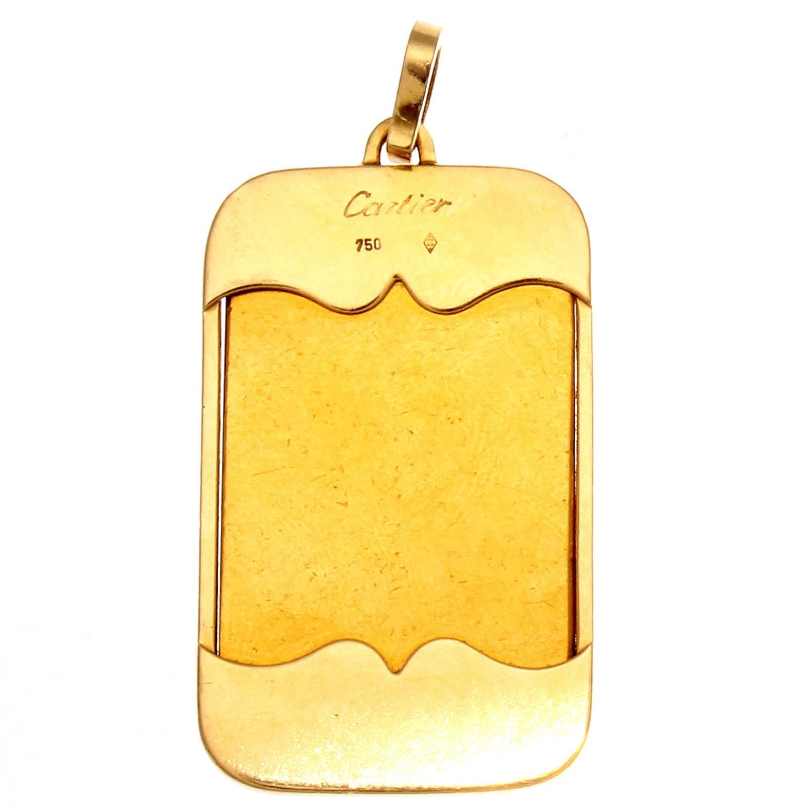 A unique replication of the gold bar featured as a pendant from Cartier. 

Signed Cartier.