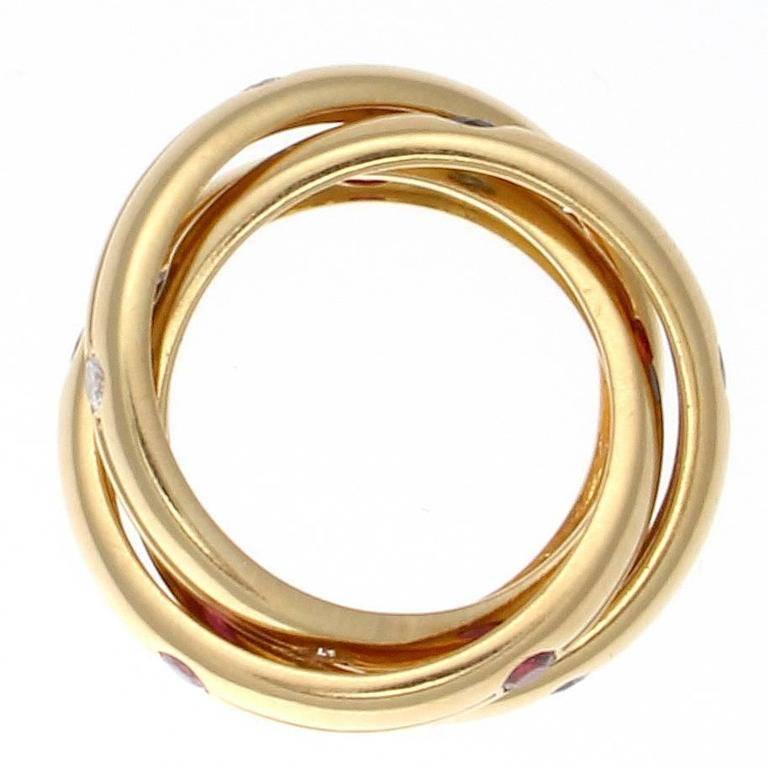 Modern Cartier Trinity Ruby Sapphire Diamond Gold Ring