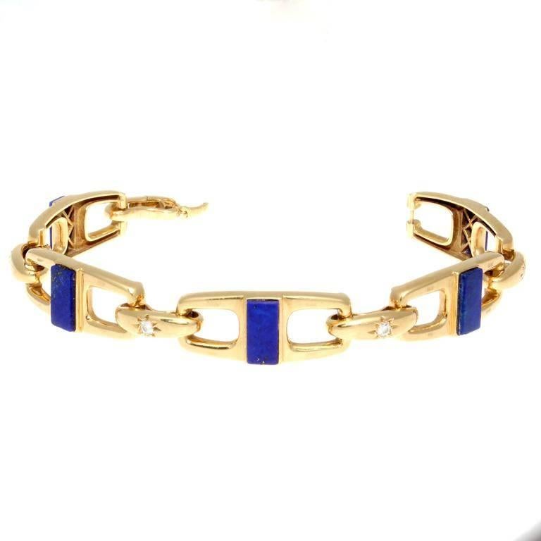 Van Cleef & Arpels, a long rich history of trend setting fashion that is still relevant today. Each link has been fashioned with a beautiful blue lapis lazuli and each link has been separated by a single near colorless diamond. Crafted in 18k yellow
