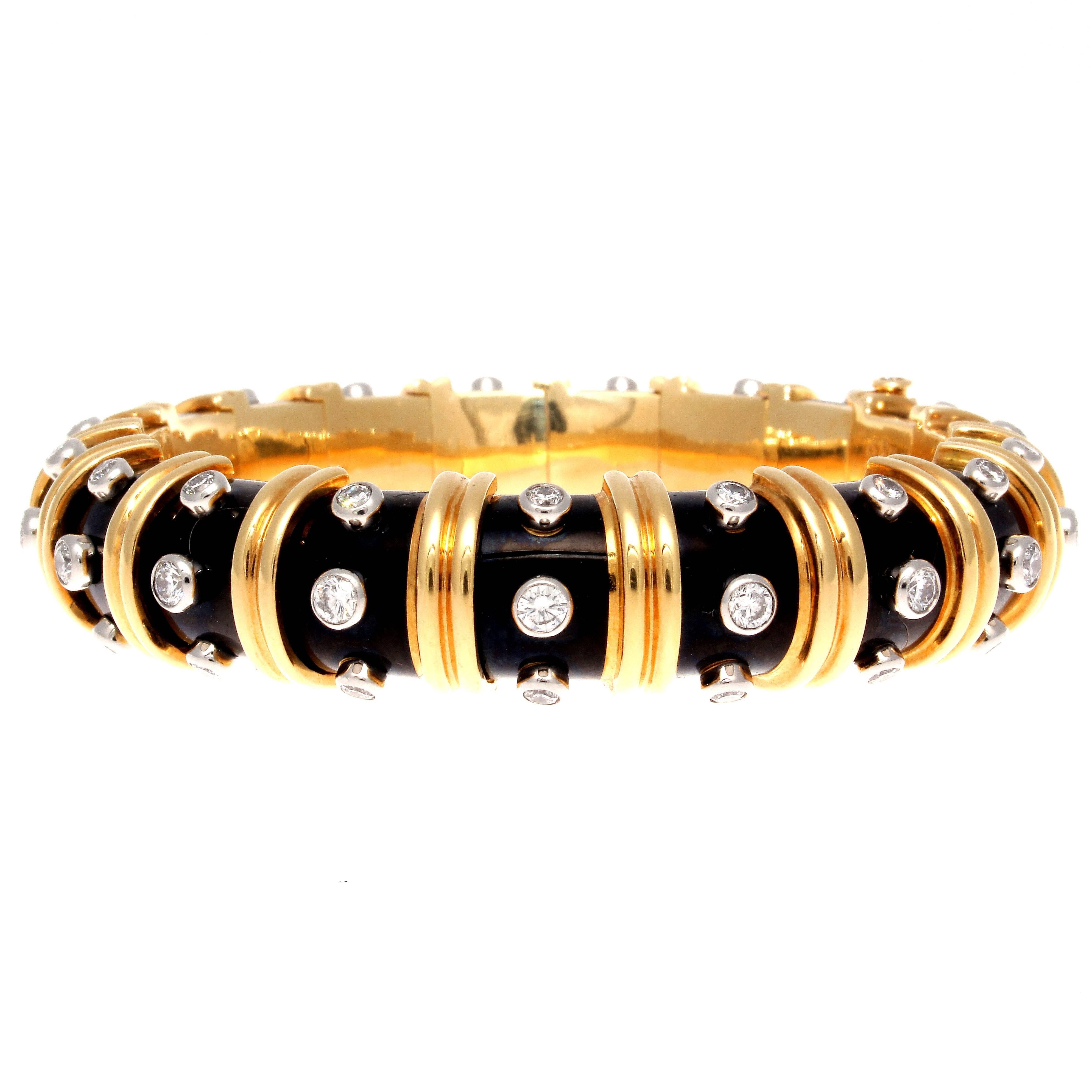Creativity and superior design is innate to Jean Schlumberger creations for Tiffany. This striking onyx Paillone bangle bracelet features one of the best combinations of color in jewelry. Created with distinct jet black enamel, partitioned by ribs
