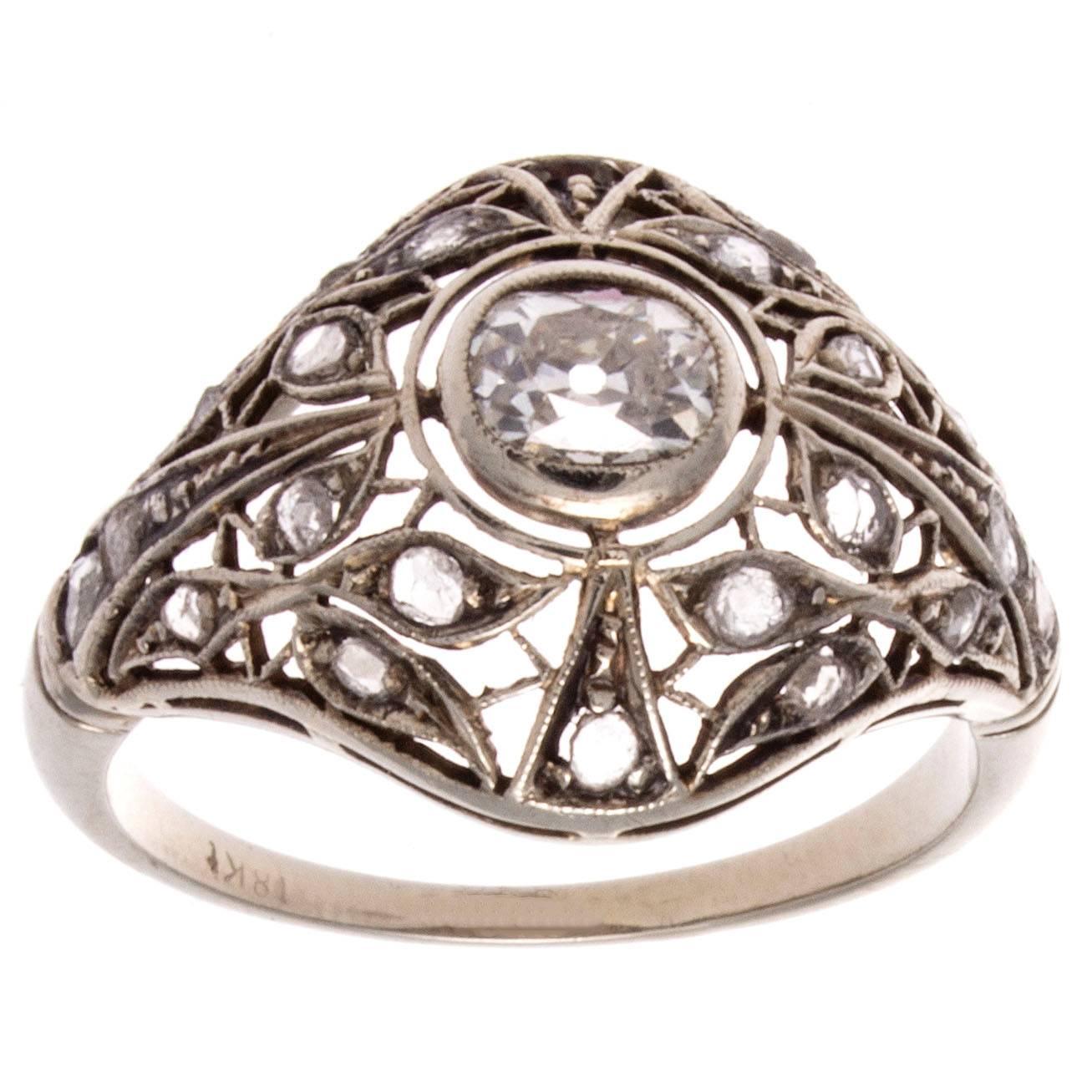 An elaborately hand crafted creation of superior craftsmanship. During the Victorian era there was an explosion of jewelry because of technology advances making jewelry available to the middle class and not just the aristocrats. This ring has been