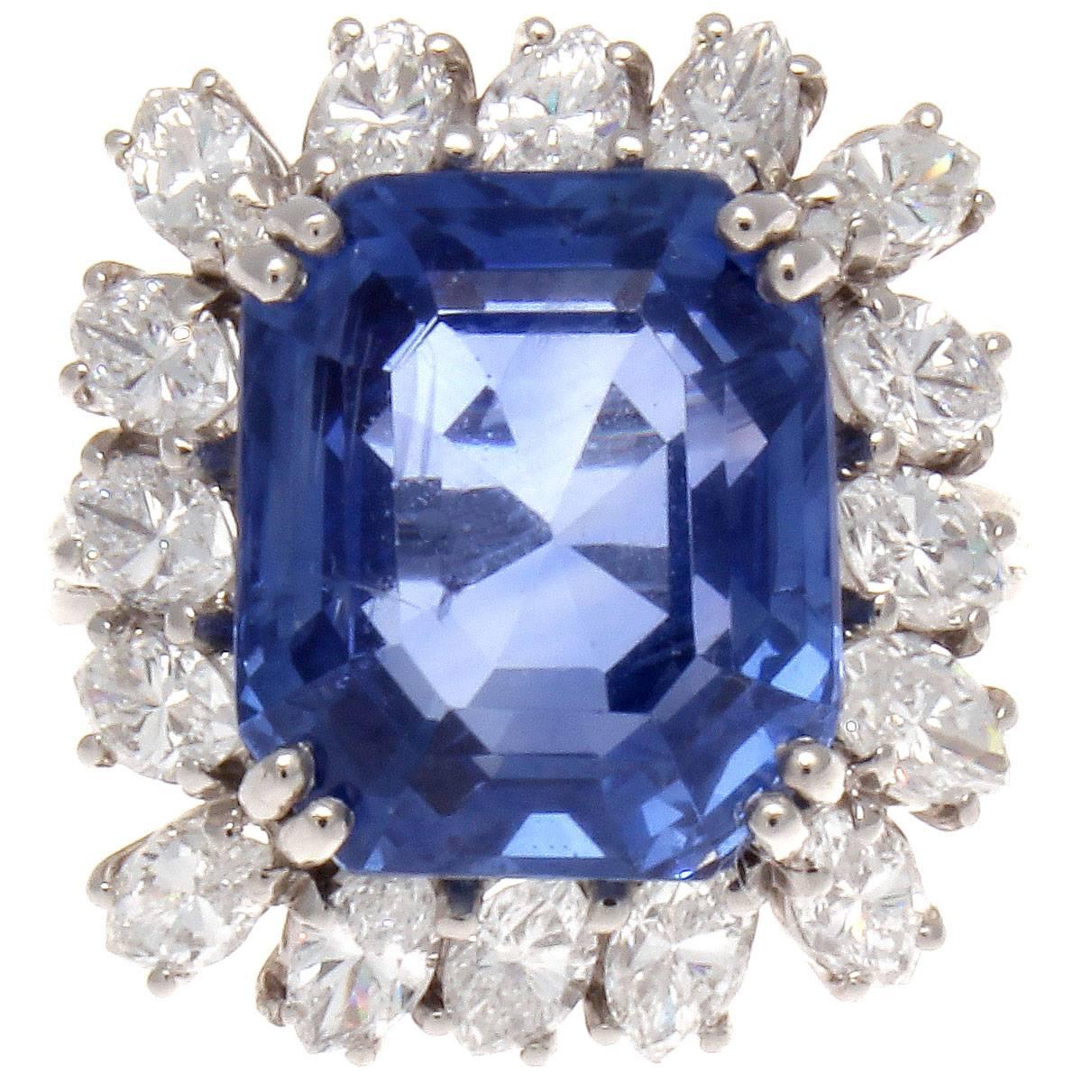 A mesmerizing design of serene color and superior style. Featuring a rare 11.76 cushion cut AGL certified ceylon sapphire that has no indications of heat treatment. The desire for these gemstones has dated throughout history with Marco Polo writing