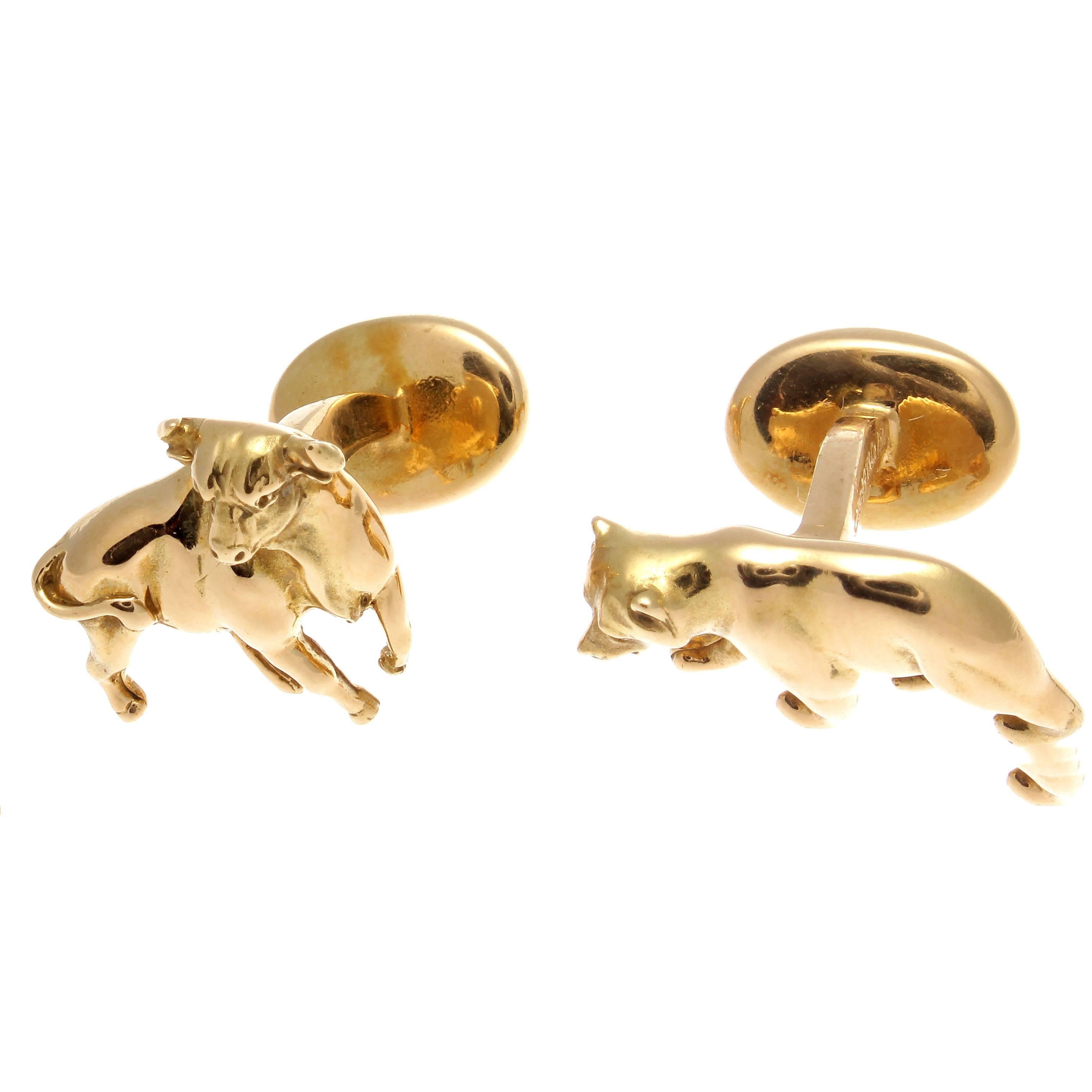 The two infamous animals people love and hate on Wall Street. Replicated in glistening 18k yellow gold by Tiffany & Co.