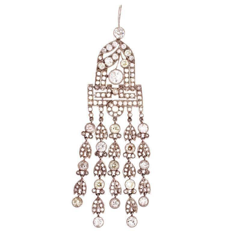 An alluring chandelier design of pure excellence. Inspired by the historic Victorian jewelry period that changed the way we see jewelry. Created with approximately 16 carats of old European cut diamonds that are perfectly matched and are G color