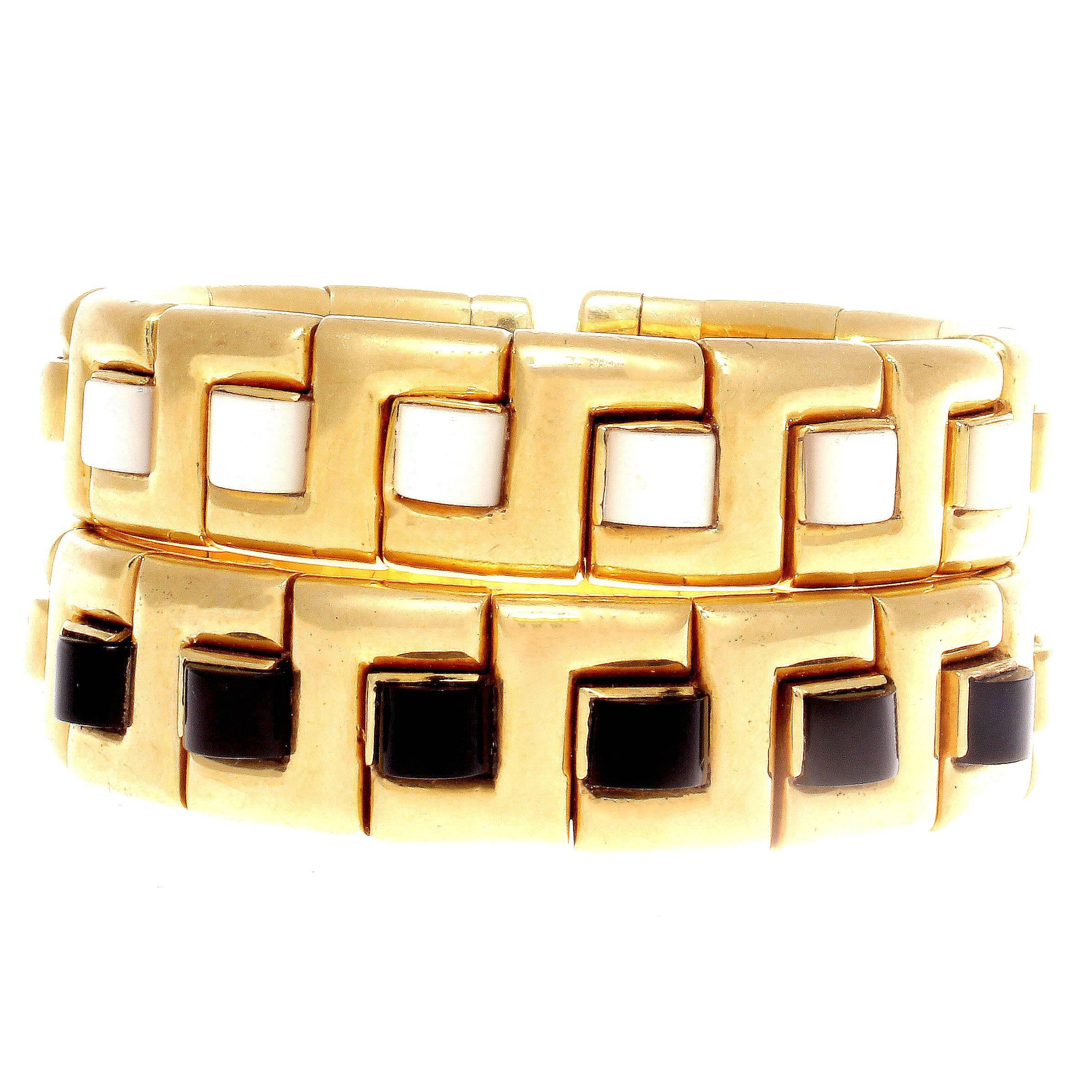 A beautiful creation of Italian elegance. Featuring perfectly spaced jet black onyx separating the carved glistening 18k yellow gold. Stamped Italy.

Please contact us if you would you would like to purchase the matching mother-of-pearl bracelet. 
