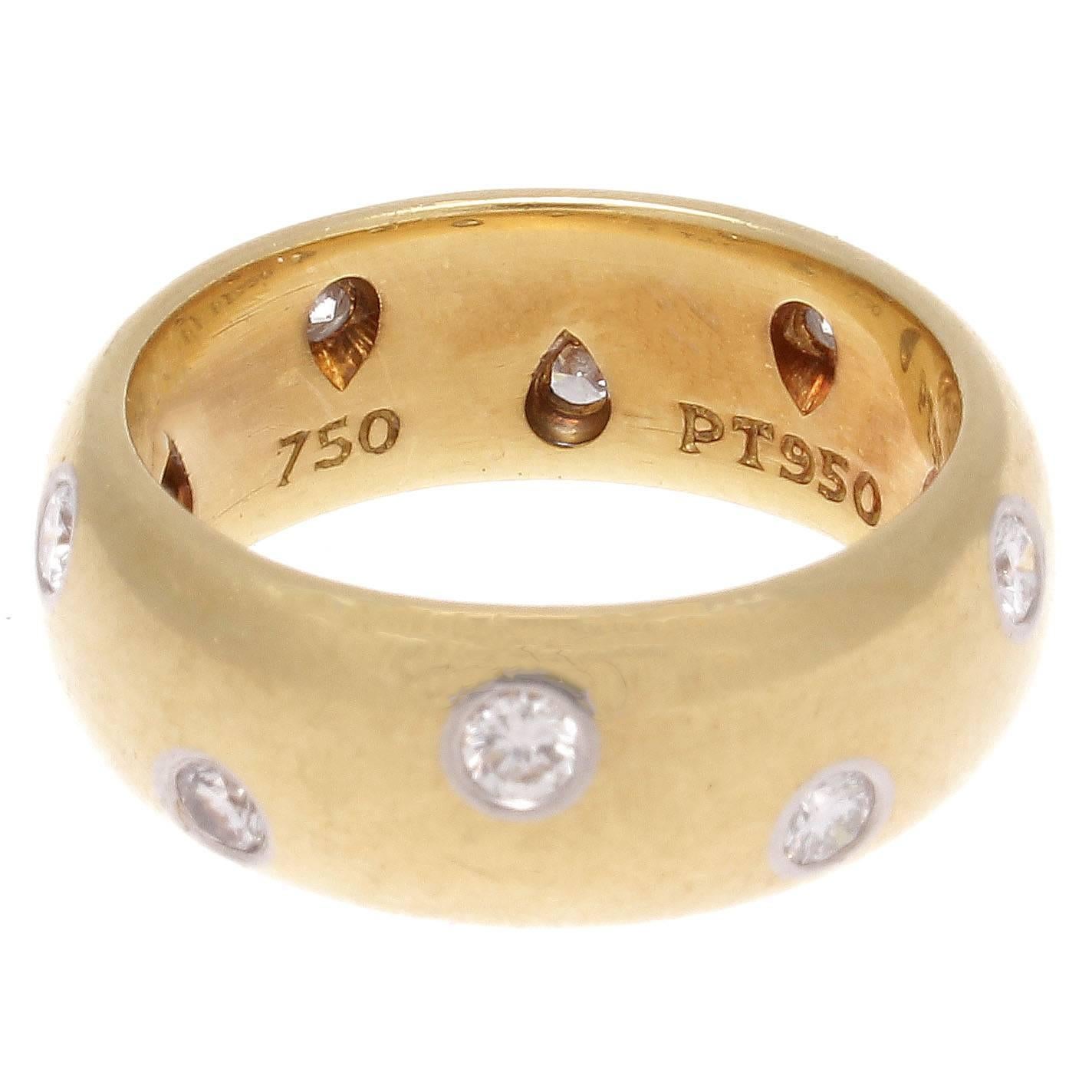 Tiffany's elegance is exemplified through their superb designs. The ring orbits perfectly around the finger with stars of diamonds placed throughout this celestial creation. Crafted in 18k yellow gold and platinum. Signed T & Co. 

Ring size